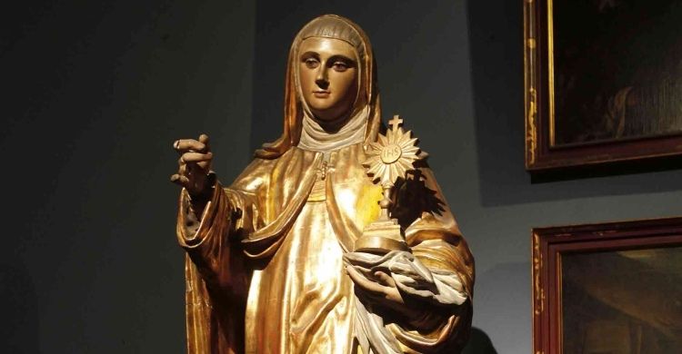 Statua lignea raffigurante santa Chiara d'Assisi con ostensorio, XVII secolo, Basilica di san Giovanni apostolo ed evangelista, Lima, Perù.